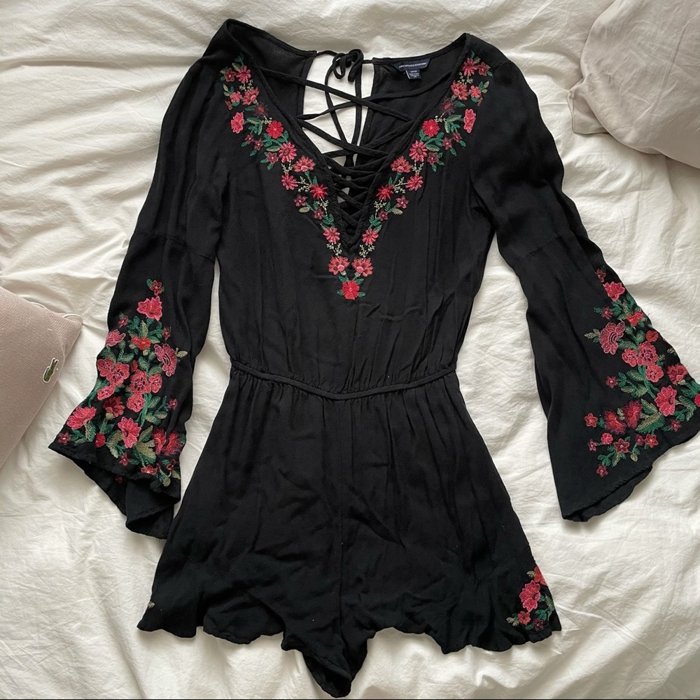 black floral romper with lace up detail